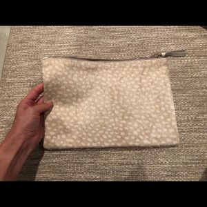 Claire V. Gray pony hair clutch.